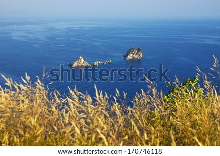 Katic and Sveta Nedjelja are two rocky islet opposite the town of Petrovac, Montenegro. The church Sveta Nedjelja stands on the smaller of two islands