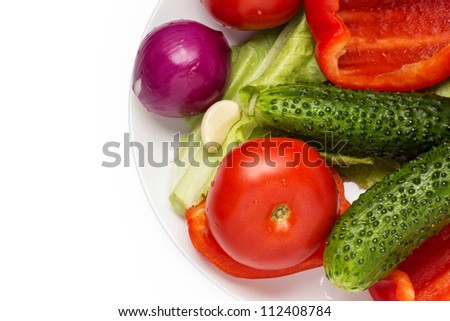part plate with vegetables isolated on white background