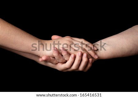 granddaughter and grandmother holding hands, support theme