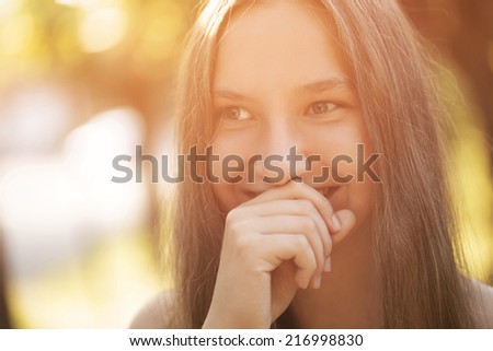 teen girl smiling on outdoor walk, summer time