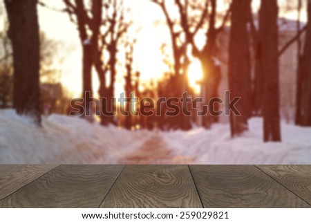 wood background for placing product with winter blurred backdrop