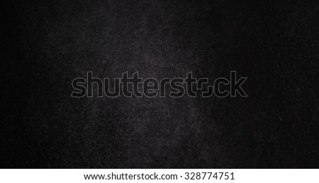 flour dust particles on black background, motion blur