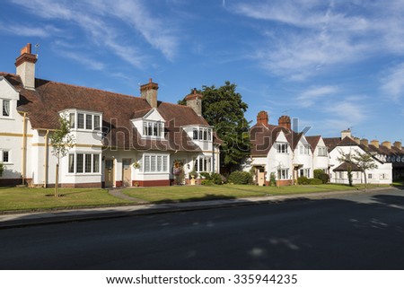 PORT SUNLIGHT, MERSEYSIDE/UK - JUNE 11, 2015: Arts and crafts architecture in garden village on Wirral. The village contains 900 Grade II listed buildings and was declared a Conservation Area in 1978.