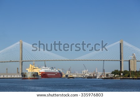 SAVANNAH, GEORGIA/USA - OCTOBER 22, 2014: Nina Marie bulk carrier ship steams up the Savannah river. Savannah is one of the largest container ports in the United States.