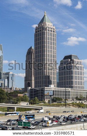 ATLANTA, GEORGIA/USA - OCTOBER 11, 2014: Midtown Atlanta skyline and Interstate. The city has at least 37 skyscrapers over 400 feet (122 m) tall.