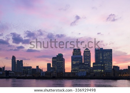 LONDON, UK - APRIL 07, 2015: Canary Wharf London skyline at dusk. Canary Wharf is a major business district located in Tower Hamlets.