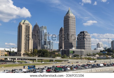 ATLANTA, GEORGIA/USA - OCTOBER 11, 2014: Atlanta skyline and Interstate 75 and 85. The history of skyscrapers in Atlanta began with the completion in 1892 of the Equitable Building.
