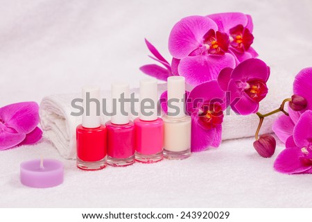 Nail polish for french manicure decorated with orchid flower