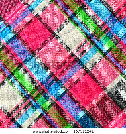 Colorful checkered loincloth fabric background Colorful checkered loincloth fabric background