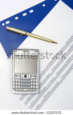 finance balance with a pen and mobile