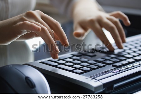 Hands on keyboard. Office work.