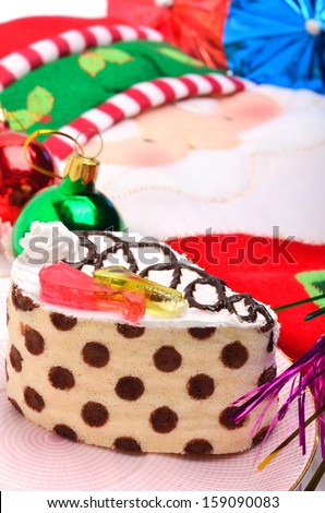 Christmas cake, christmas baubles and  Santa Claus oven glove