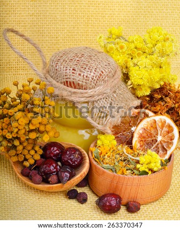 Ã?Â�Ã?Â¡alendula flower, oats, immortelle flower, tansy herb, honey, wild rose, dried lemon on sacking background