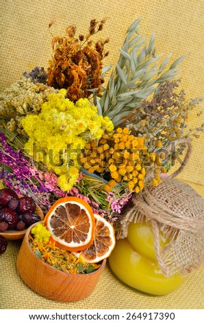 Medicinal herbs with honey, calendula, oats, immortelle flower, tansy herb, wild rose, dried lemon
