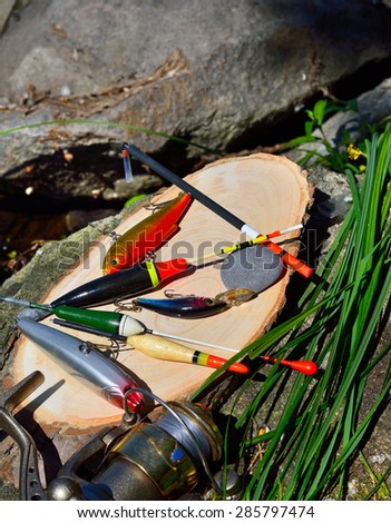 fishing tackle against the backdrop of the stone