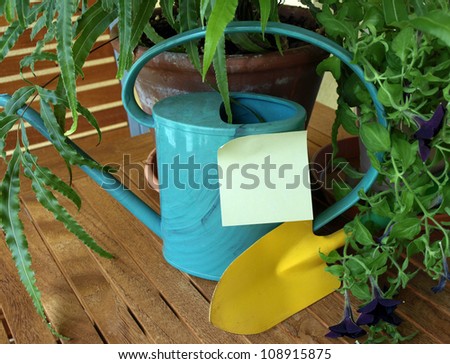 Watering can and post-it