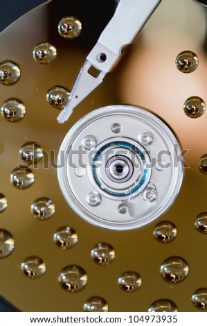 Hard disk with drops of water detail close-up