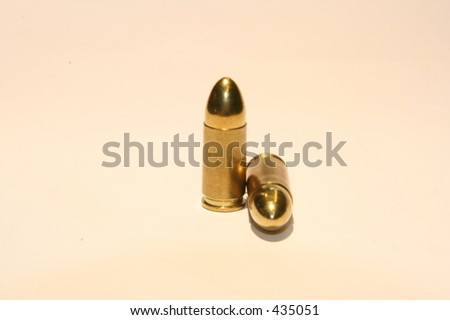 two 9mm pistol bullets