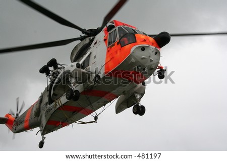 A Sea King rescue helicopter hovering.