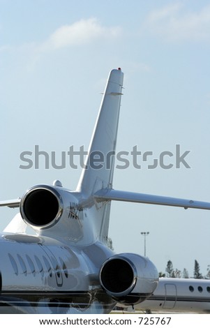 Tail of a three engine jet falcon