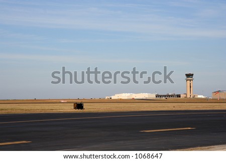 Airport layout seen from the ground - airport tower in the background