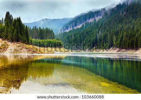 Landscape with lake Galbenu in Parang mountains in Romania