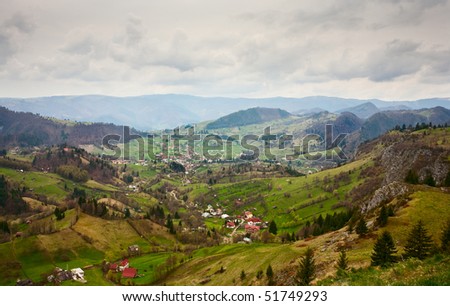 Beautiful landscape with village houses and mountains