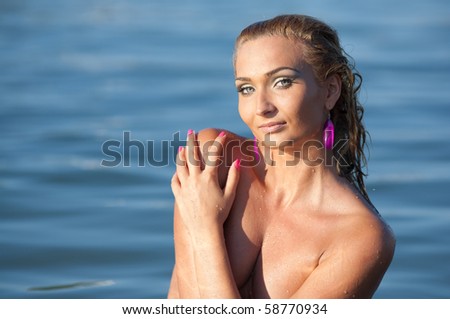 Portrait of a young lady in sea water