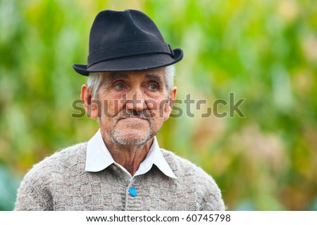 Portrait of an old farmer outdoor