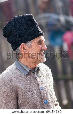 Portrait of an old rural man outdoor