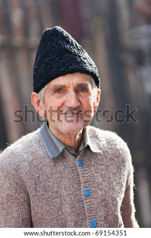 Portrait of an old rural man outdoor