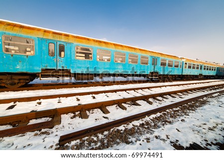 Railway covered with snow in a sunny winter day