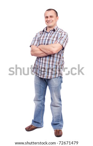 Full length portrait of a casual dressed young man isolated on white background