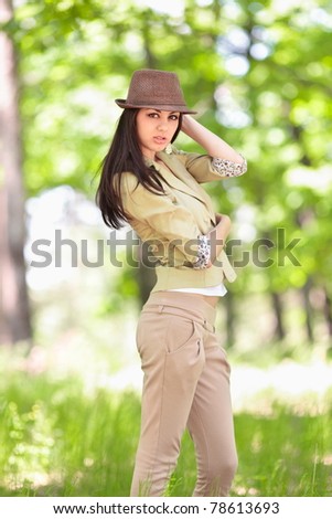 Portrait of a beautiful latin young woman outdoor in the forest