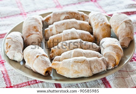 Closeup of crusty cookies coated with sugar powder