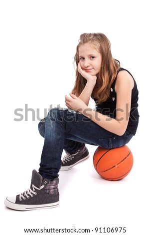 Portrait of a girl with basketball isolated on white background