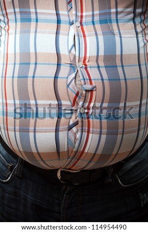 Closeup of a tight shirt on belly