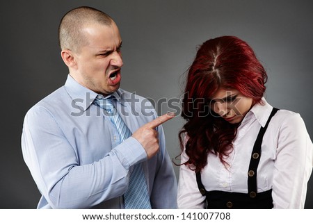 Boss angry on a new employee, shouting, threatening