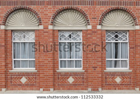 Great Brick work on this wall around three wonderful windows.