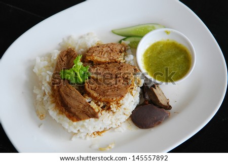 Chinese Five Spiced stewed duck on cooked rice,delicious and very popular Thailand