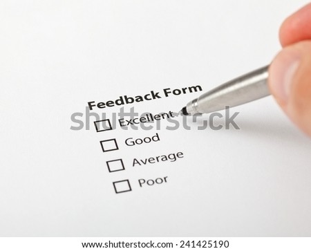 Decision moment. Man is about to fill the feedback form.  Quality control concept.