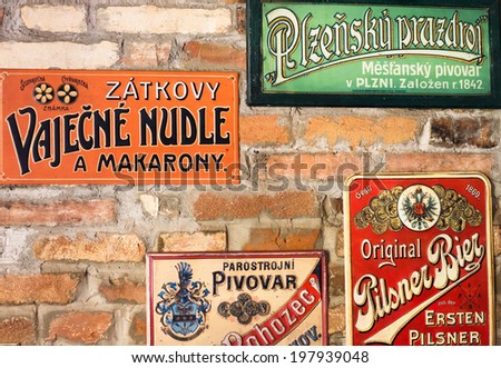 STRBSKE PLESO, SLOVAKIA - JUNE 8 2014: Old beer signs in a restaurant on the wall