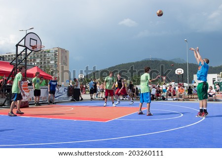 RUZOMBEROK, SLOVAKIA - MAY 24 2014: Three points shot during streetball competition
