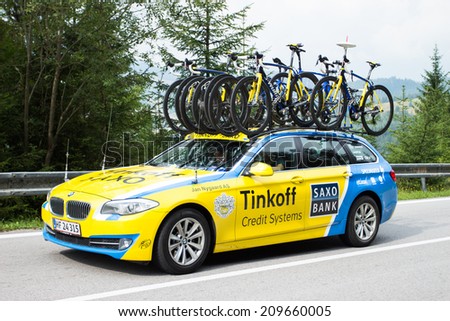 HUTY, SLOVAKIA - AUGUST 07, 2014: Tinkoff Saxo bank professional cycling team car