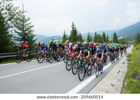 HUTY, SLOVAKIA - AUGUST 07, 2014: Professional cyclists peloton on tour