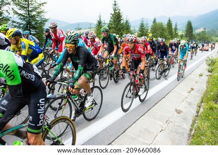 HUTY, SLOVAKIA - AUGUST 07, 2014: Professional cyclists peloton on tour