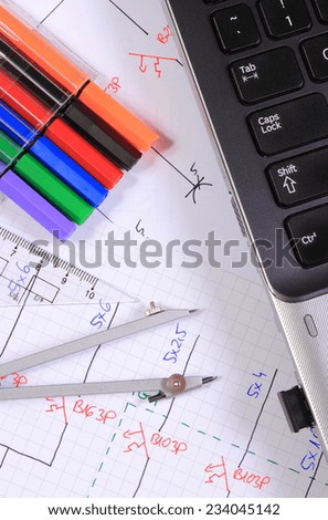 Electrical diagrams, accessories for drawing and laptop, drawings and accessories for the projects engineer jobs