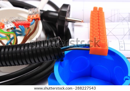 Components for use in electrical installations and rolls of electrical diagrams, copper wire connections in electrical box, energy concept
