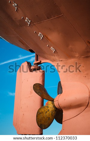Stern of ship with screw propeller and rudder