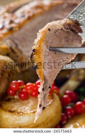 A slice of roast goose